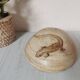 Pique flowers sandstone lizard