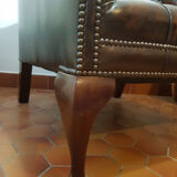 Pair of leather Chesterfield armchairs