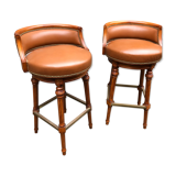 Pair of bar stools turning bar rests brass feet Hollywood Regency