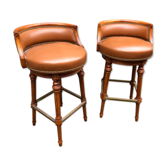 Pair of bar stools turning bar rests brass feet Hollywood Regency