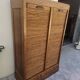 Antique 1950s double sliding door filing cabinet with curtains