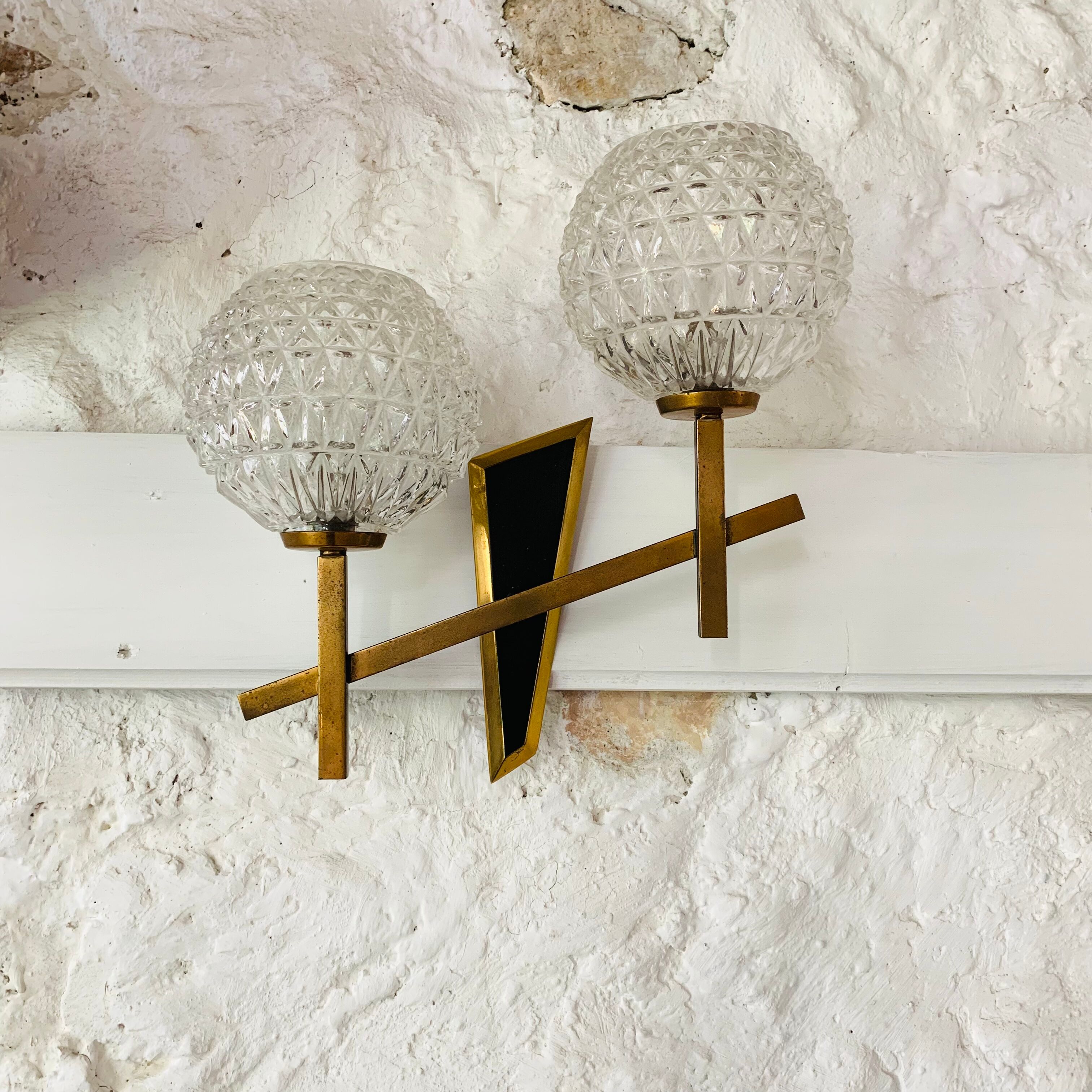 Vintage brass double wall lamp and diamond glass globe
