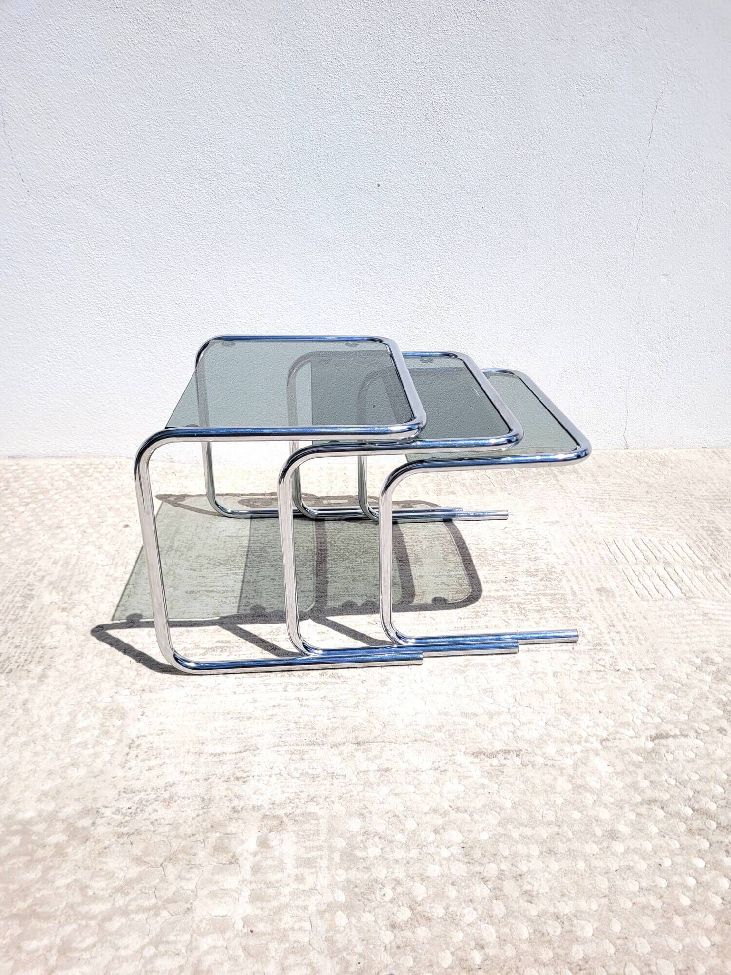 Vintage nesting coffee tables in chrome and smoked glass