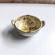 Vintage bowl signed Keraluc Quimper in yellow and green.