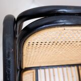 Pair of designer armchairs in curved wood and wicker