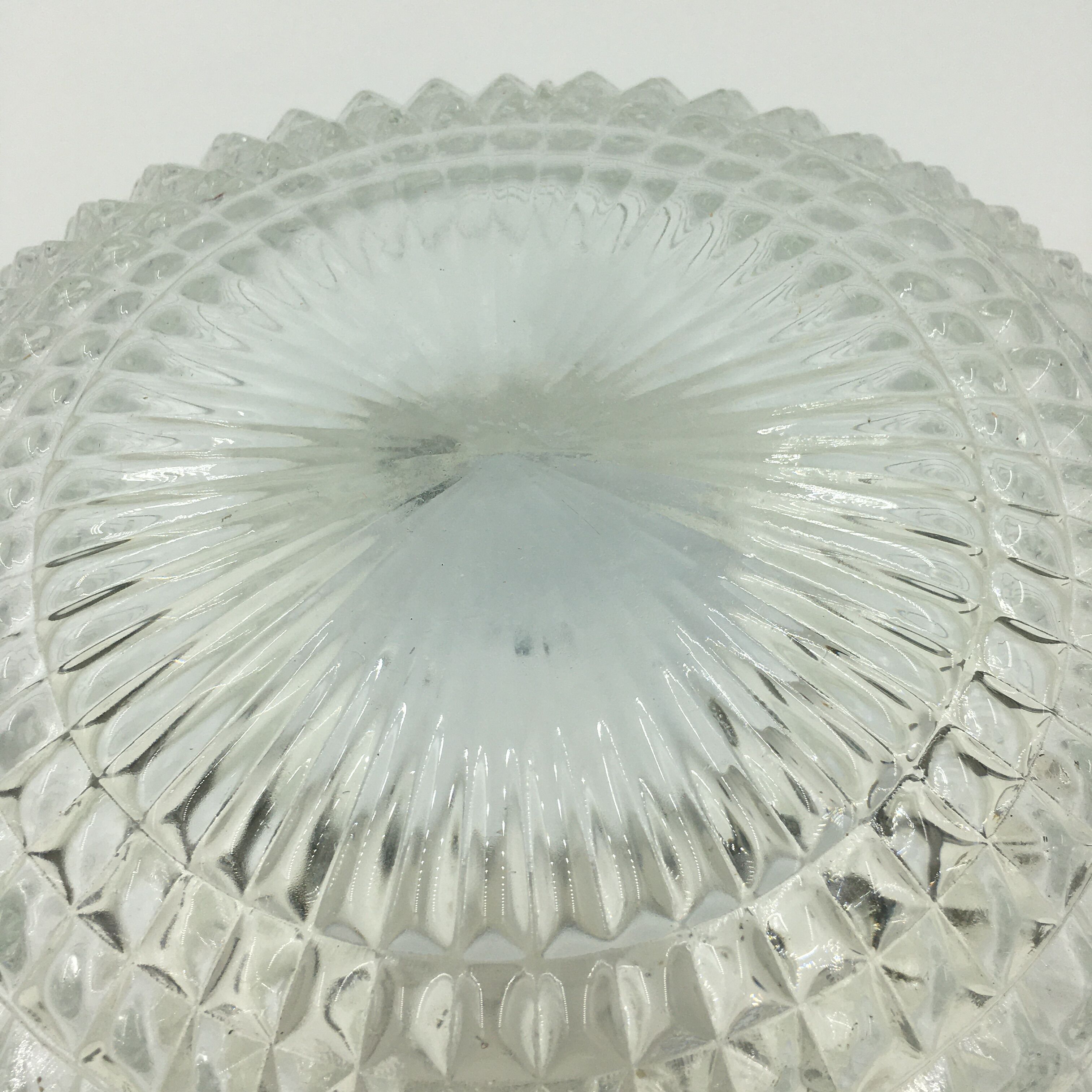 Ceiling lamp in molded glass in relief
