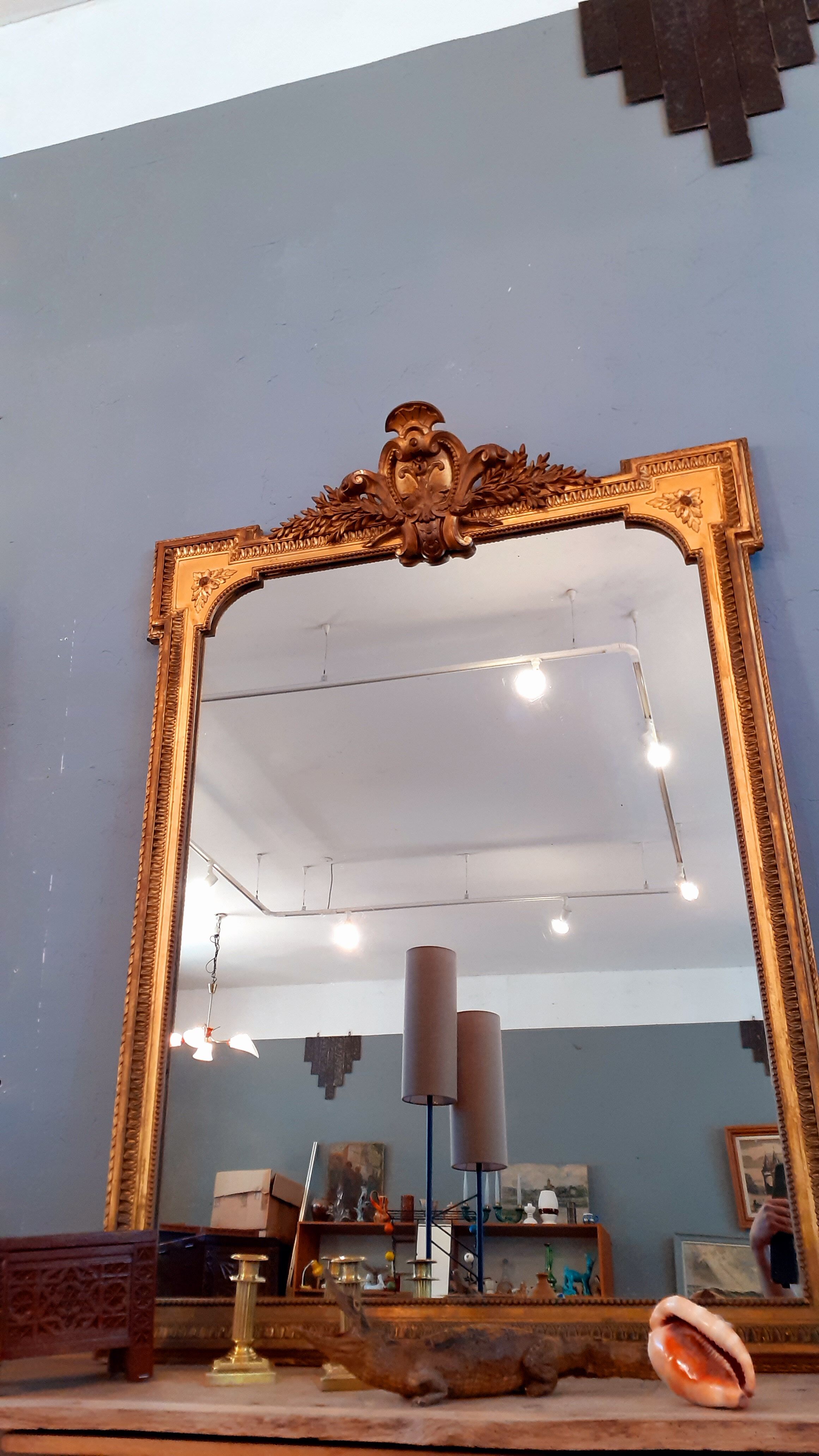 Large mirror XIX th in wood and gilded stucco Louis XVI style