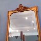 Large mirror XIX th in wood and gilded stucco Louis XVI style