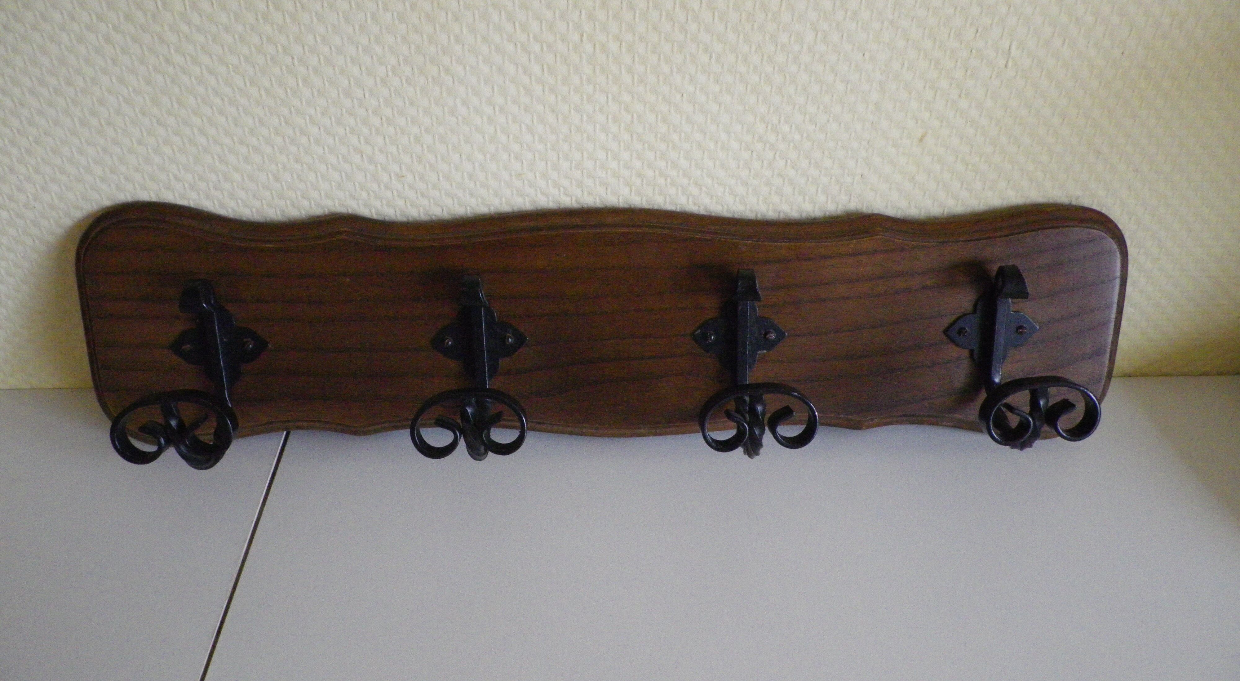 Wooden wall coat rack and its 4 wrought iron hangers, 60s