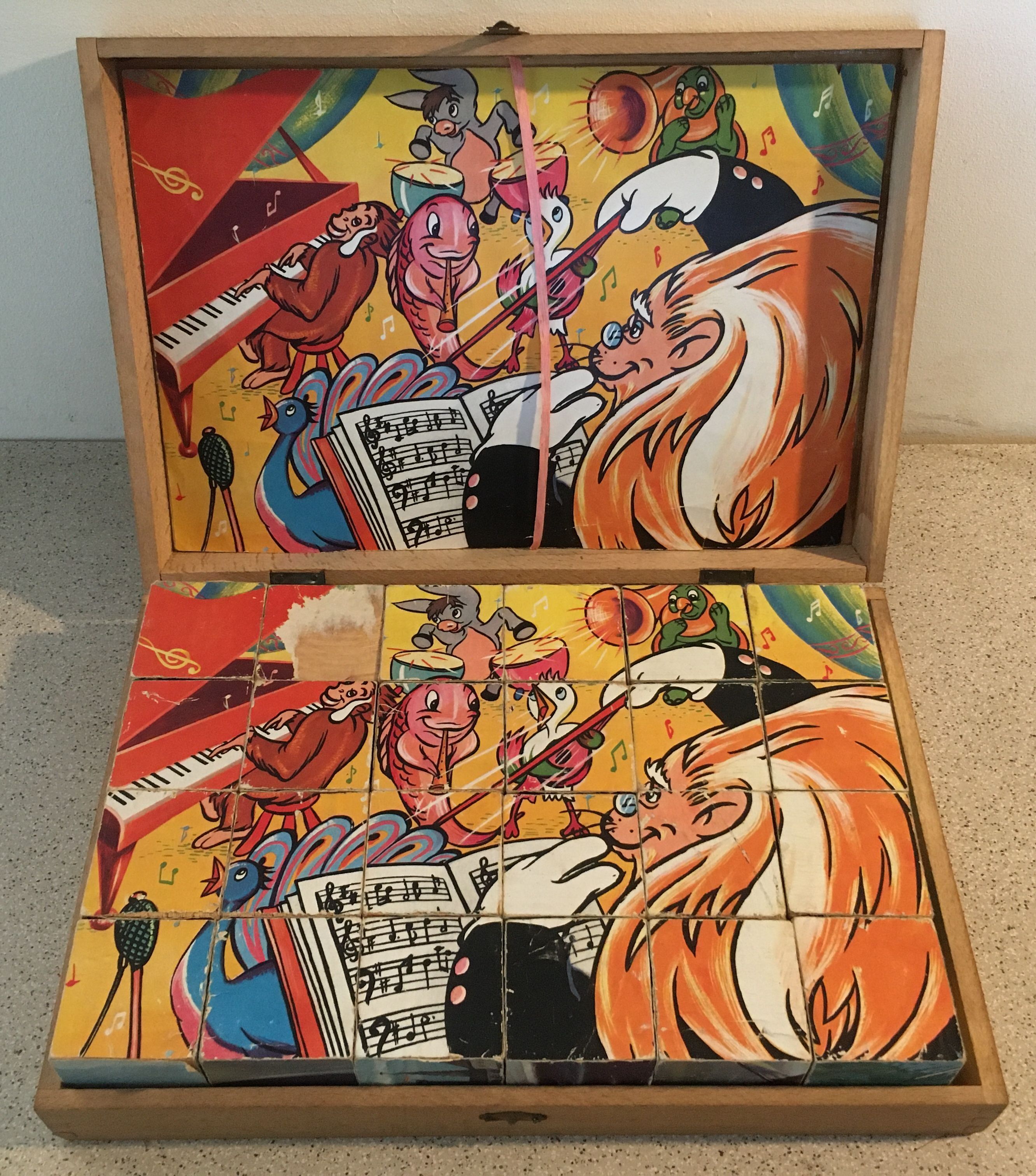 Old game of 24 wooden puzzle cubes from the 1950s