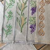 Set of 12 embroidered linen table sets