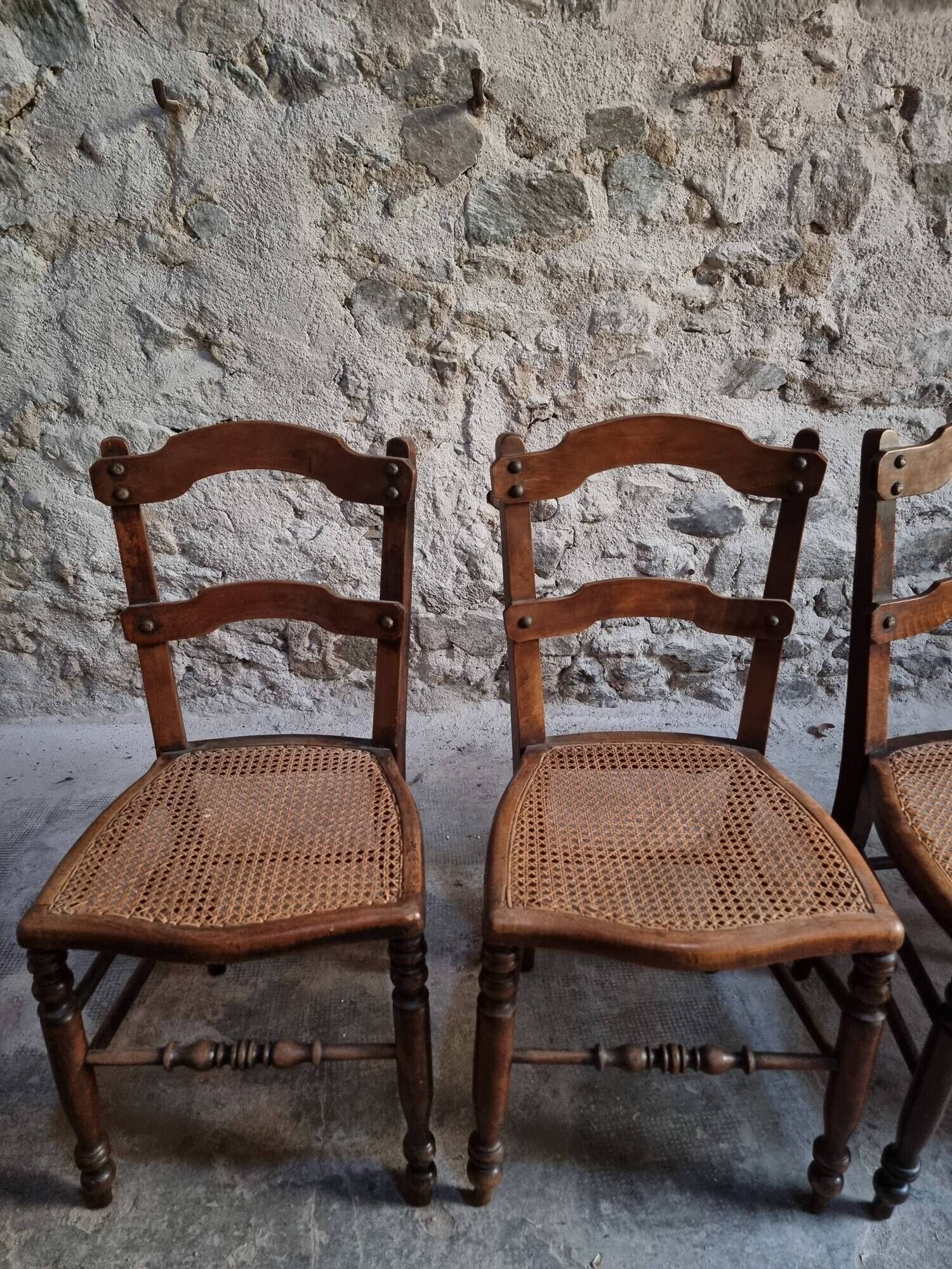 Set of 4 antique dining chairs with caned seats, beech, France, circa 1900–1920.
