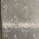 Antique dresser with glass doors and fleur-de-lys from the 50s