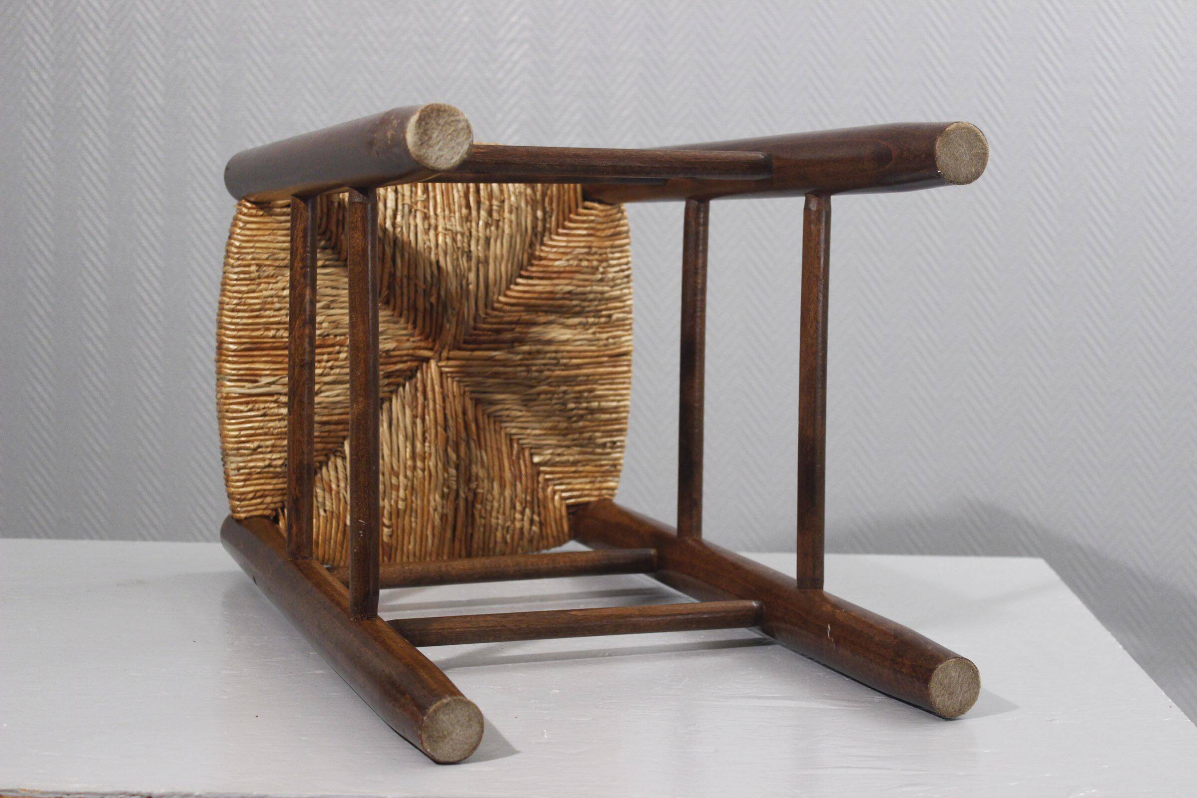 Vintage straw stool in the style of Charlotte Perriand, 1970s.