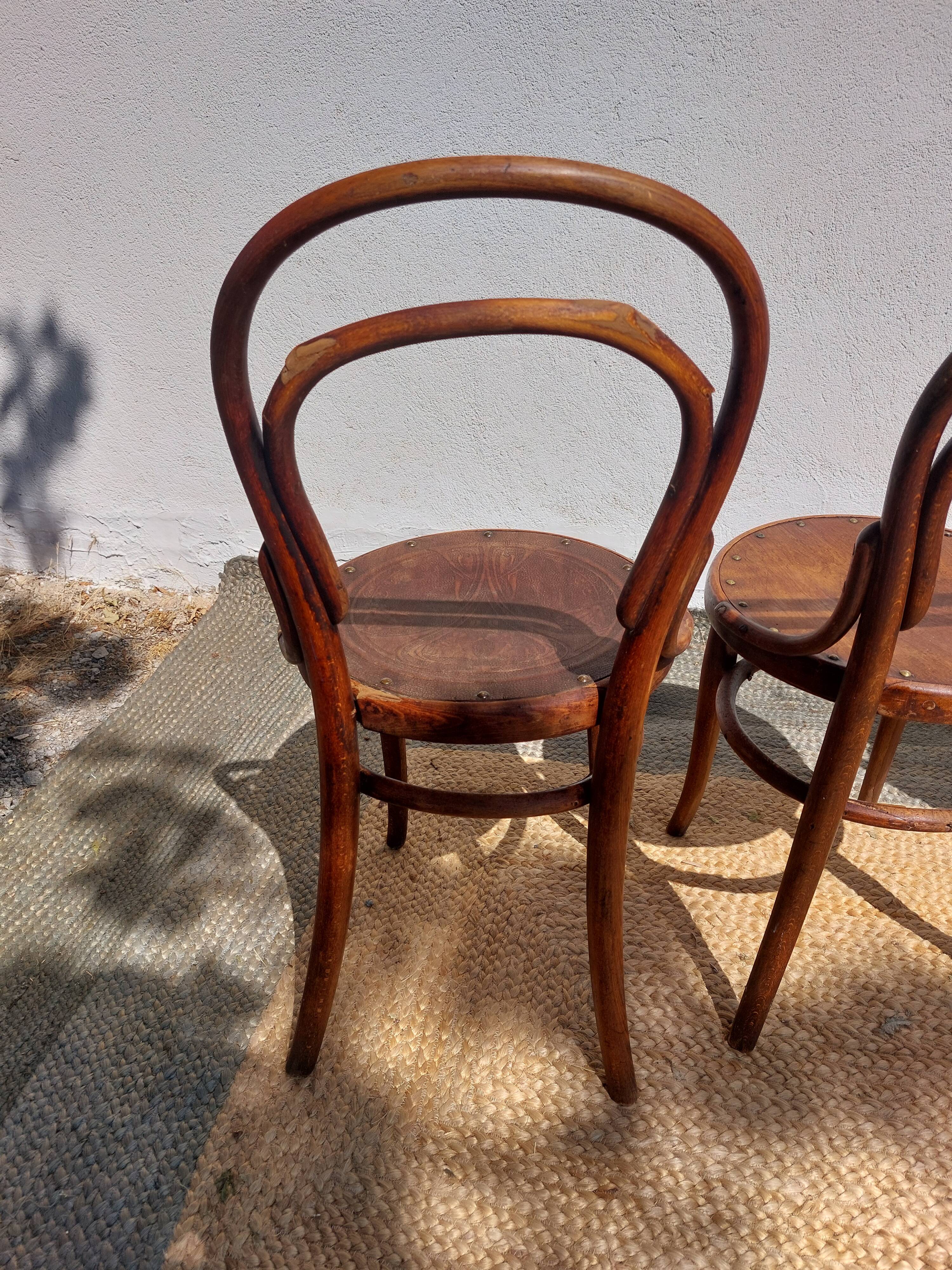 4 curved wooden bistro chairs