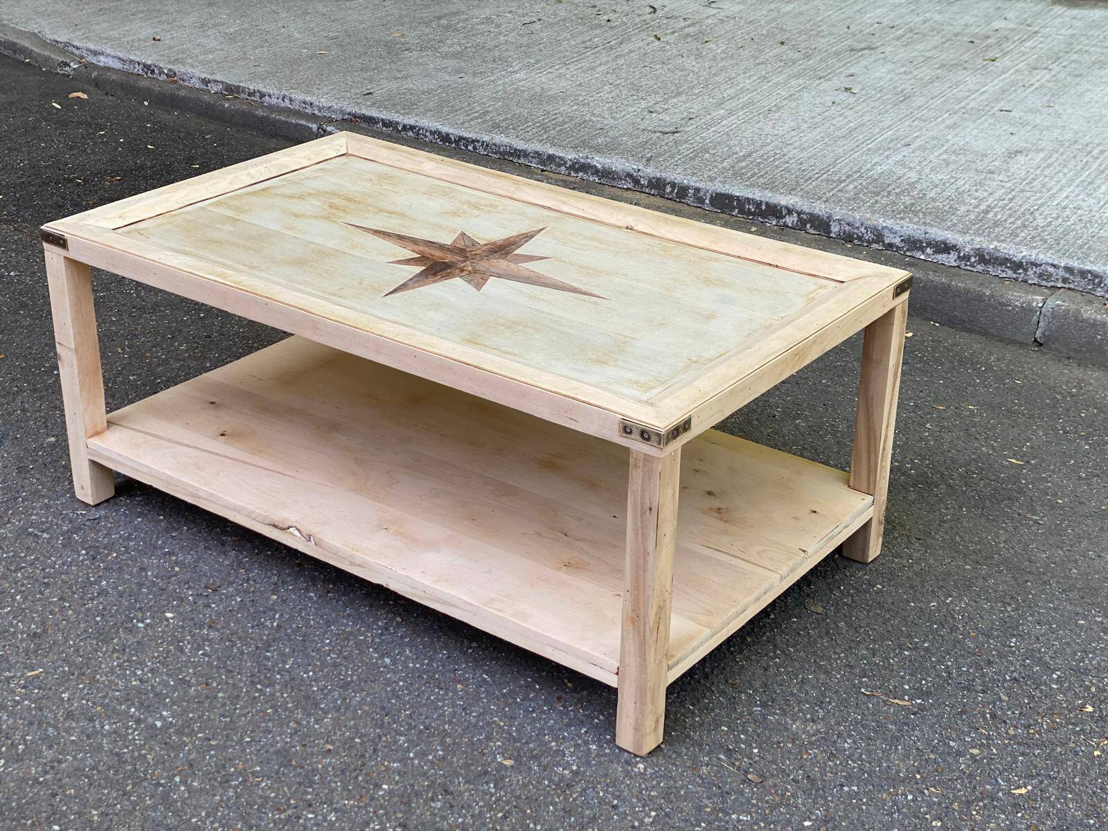 Renovated solid wood coffee table in chic country seaside style.