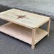 Renovated solid wood coffee table in chic country seaside style.