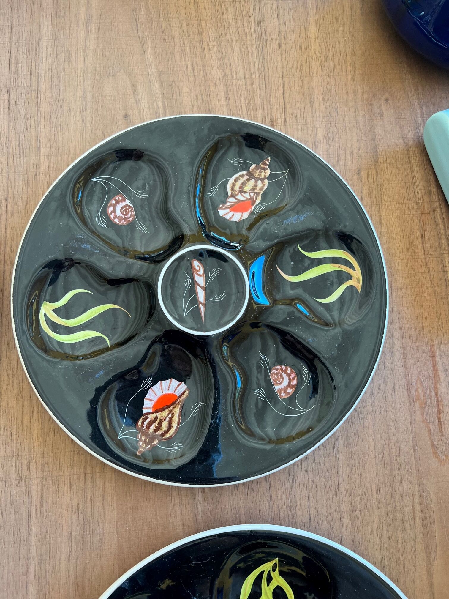 4 Henriot oyster plates