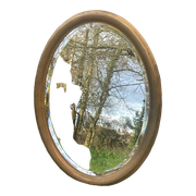 Bevelled golden oval mirror, 79 x 59 cm