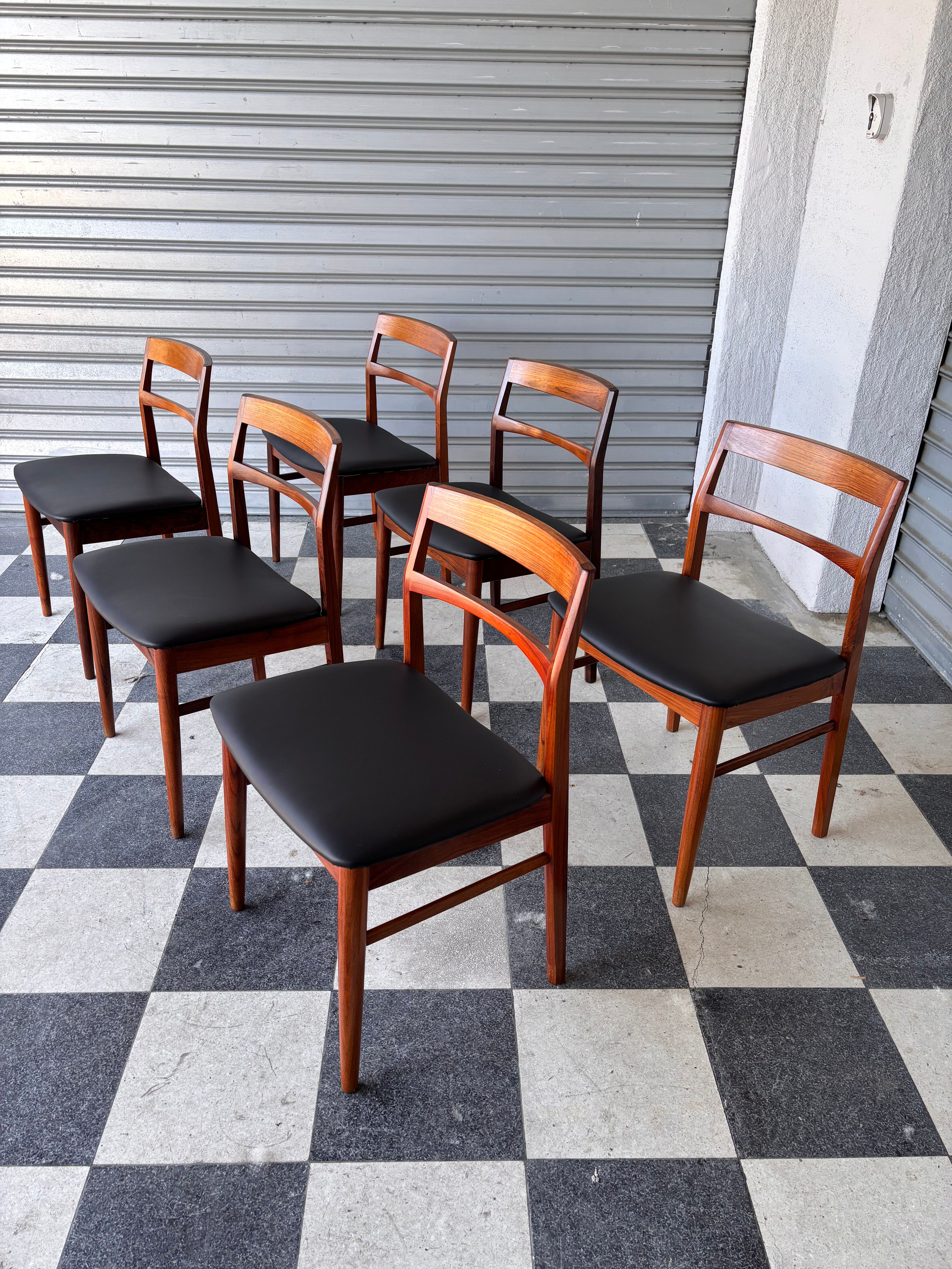 Set of 6 Henning Kjaernulf chairs in rosewood.