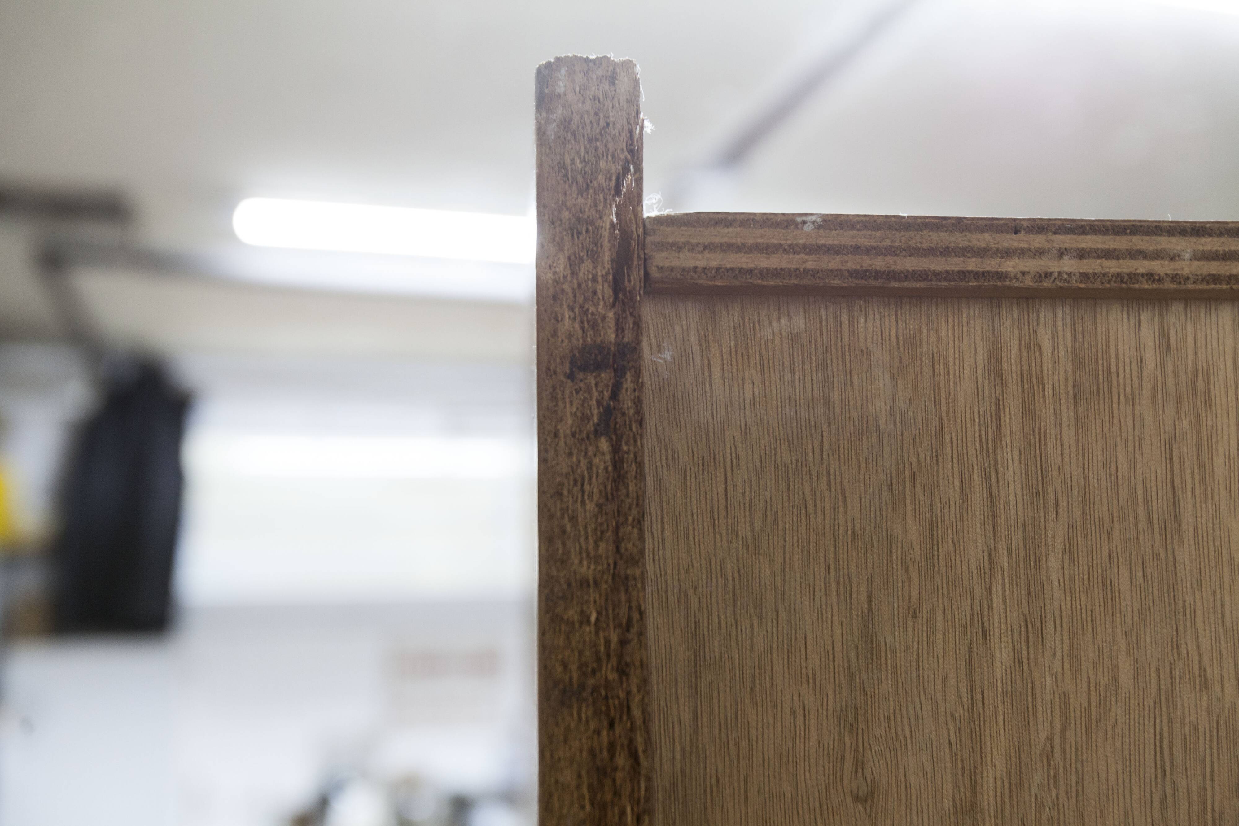 1950s Mid-Century Modern oak armoire with two doors and two drawers.