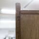 1950s Mid-Century Modern oak armoire with two doors and two drawers.