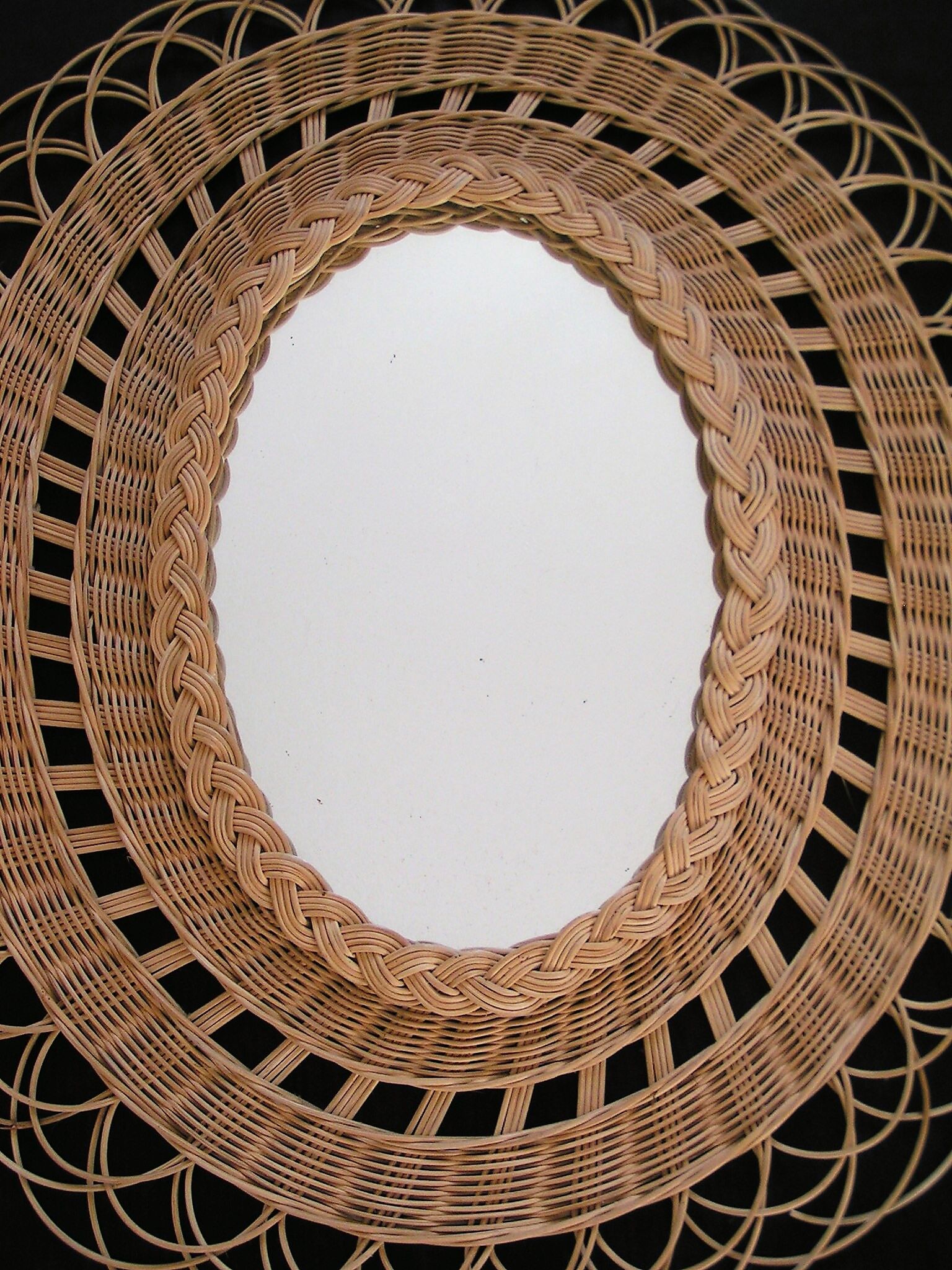 Oval sun 60s rattan mirror 59x67cm