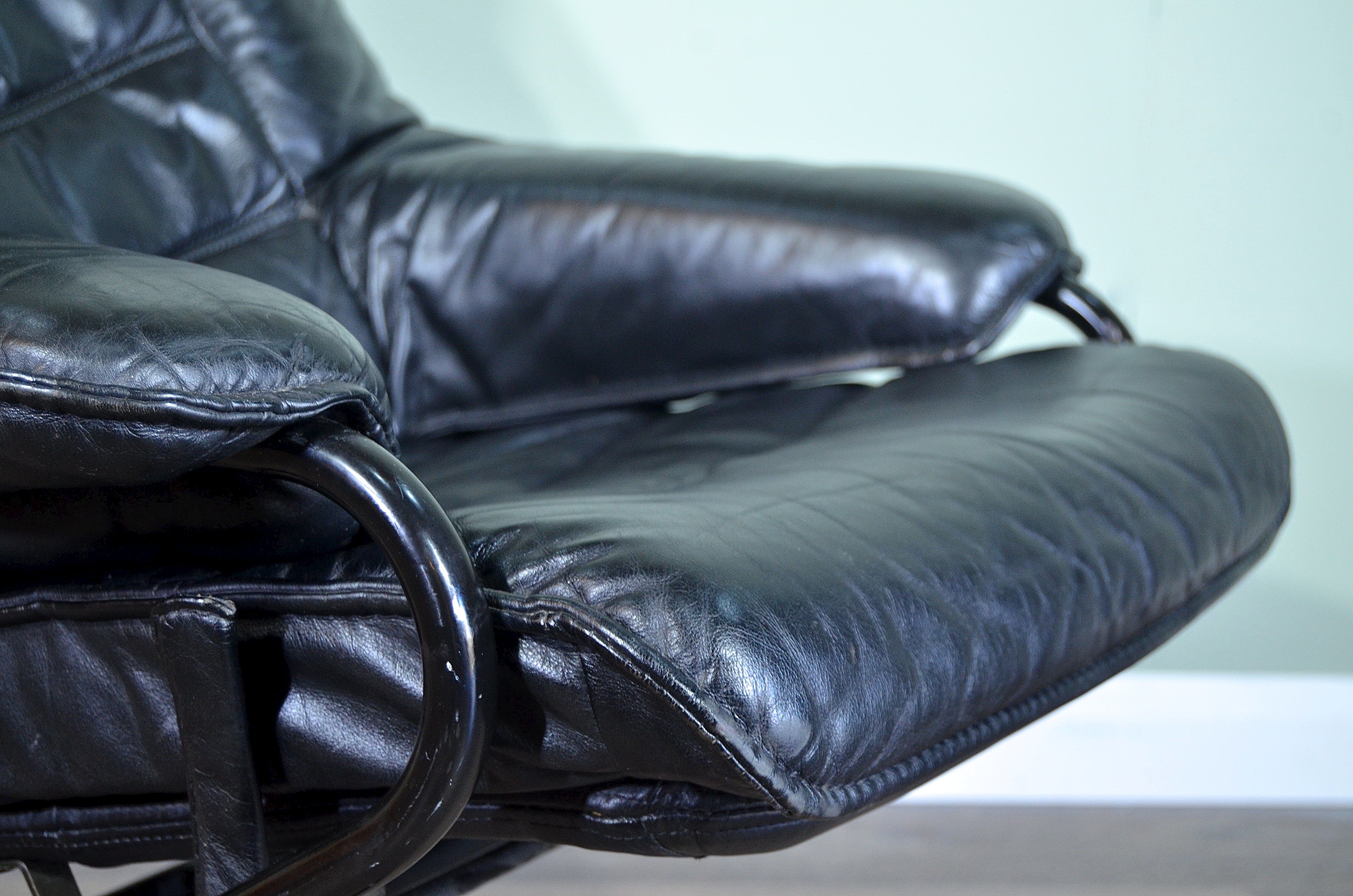 Norwegian Skoghaug industries vintage black leather swivel reclining chair