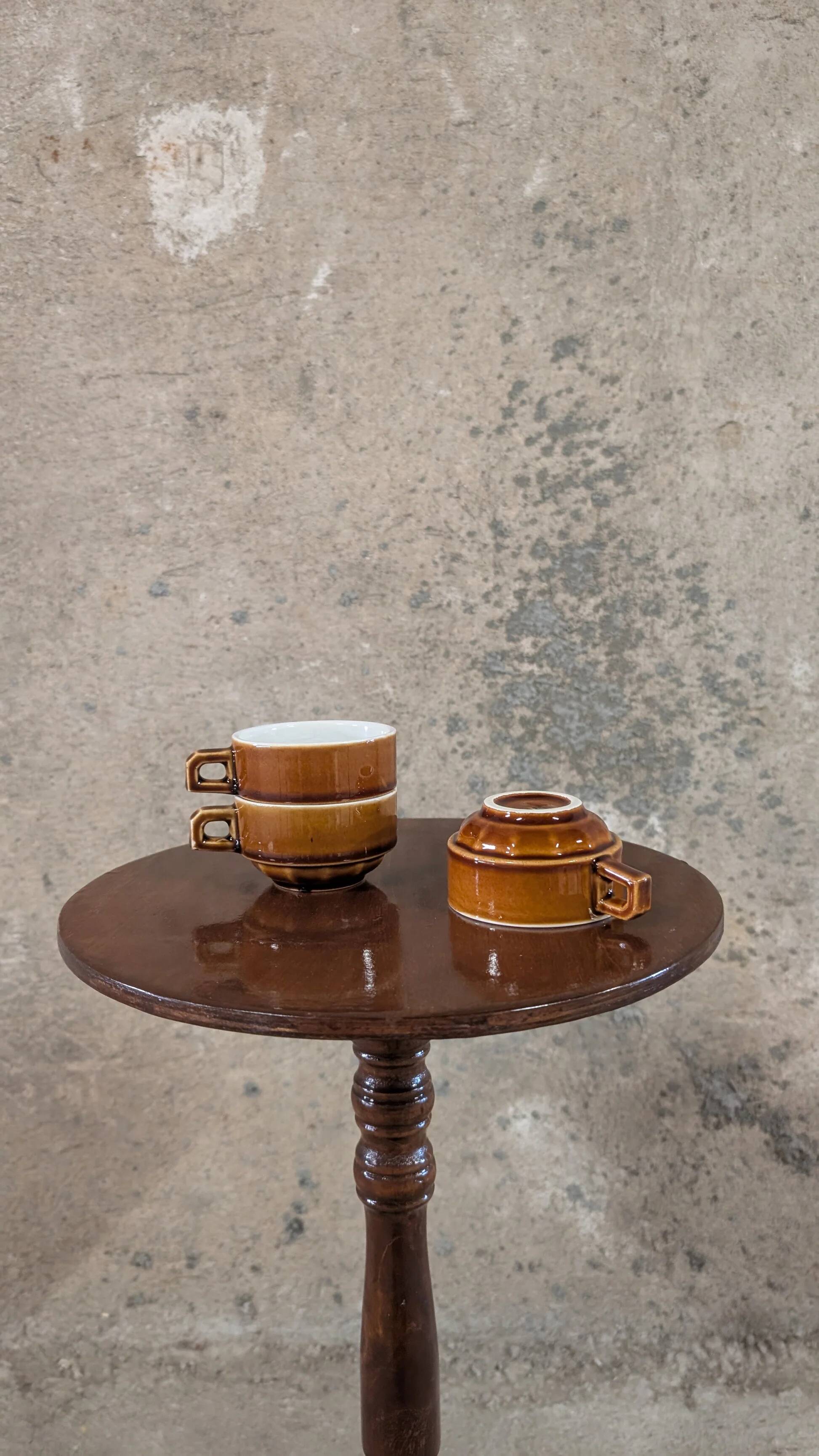 Trio of brown stoneware cups