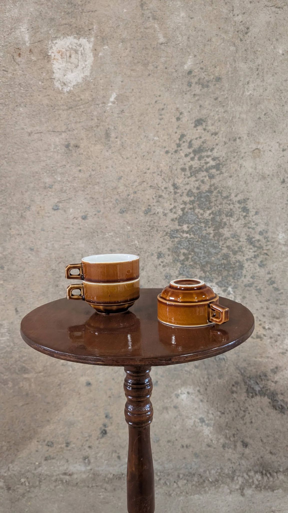 Trio of brown stoneware cups