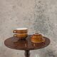Trio of brown stoneware cups