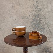 Trio of brown stoneware cups