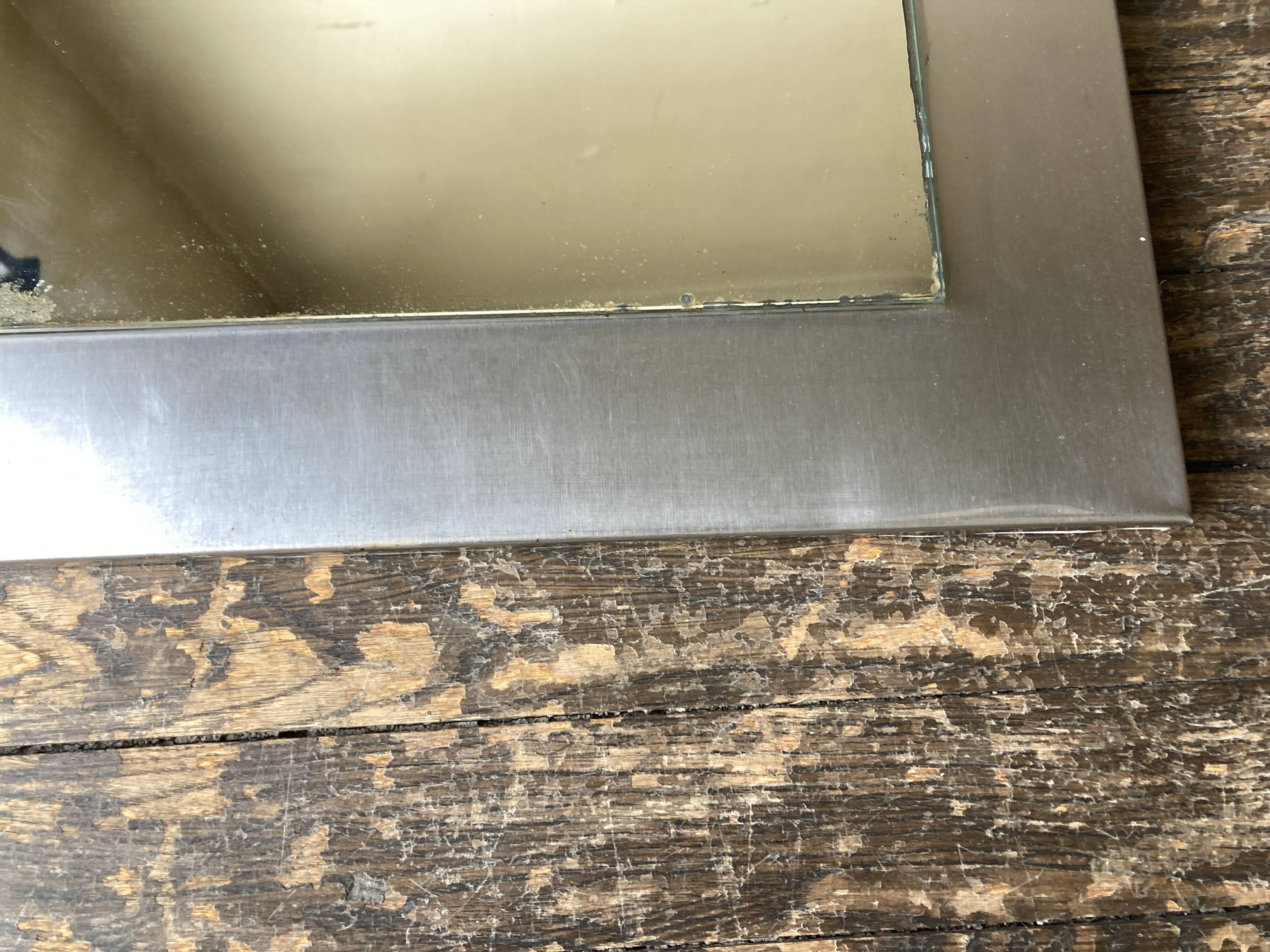 1970s space age steel mirror