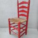 2 vintage red straw chairs