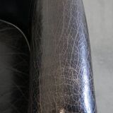 Black grained cowhide leather armchair