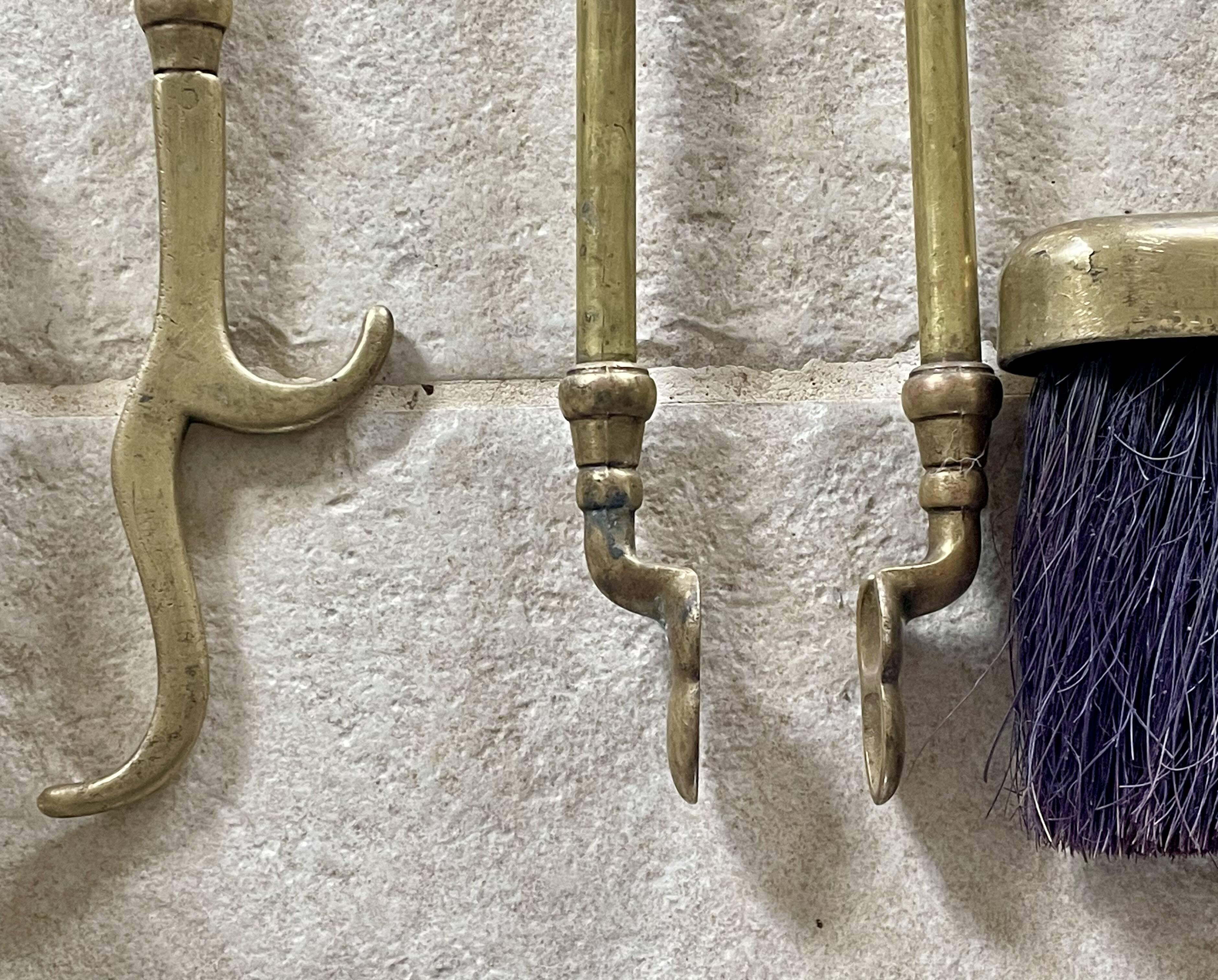 Brass fireplace accessory set with vintage stand