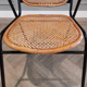 1950s chair in black metal and braided rattan