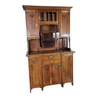 Glass-fronted oak sideboard from the Art Nouveau period.