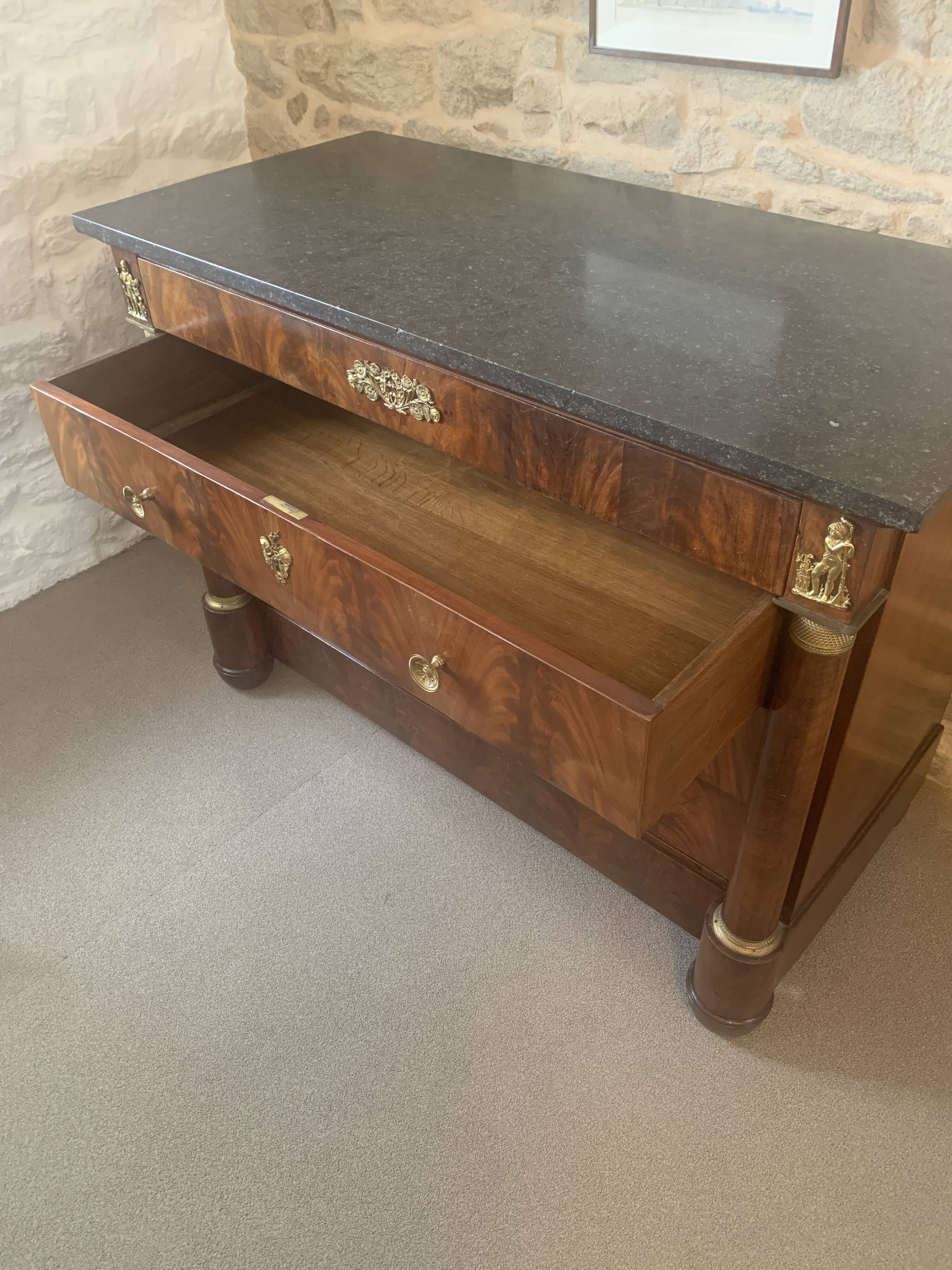 Empire chest of drawers with columns, 19th century mahogany