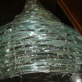 Lamp in glass pieces assembled on metal frame