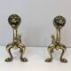 Pair of bronze andirons with lions