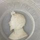 Three alabaster profiles of men, Italy around 1880