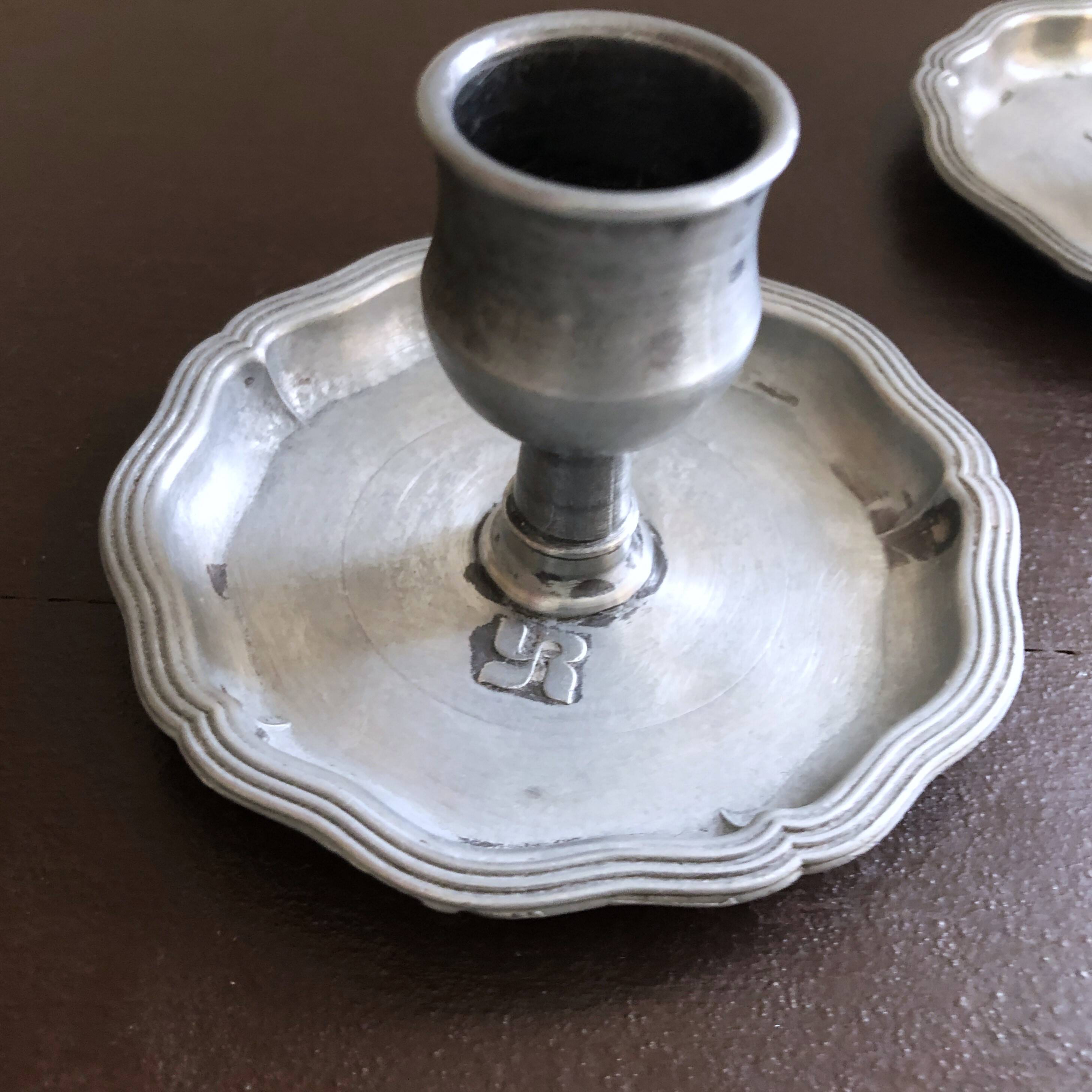 Pair of pewter table candlesticks