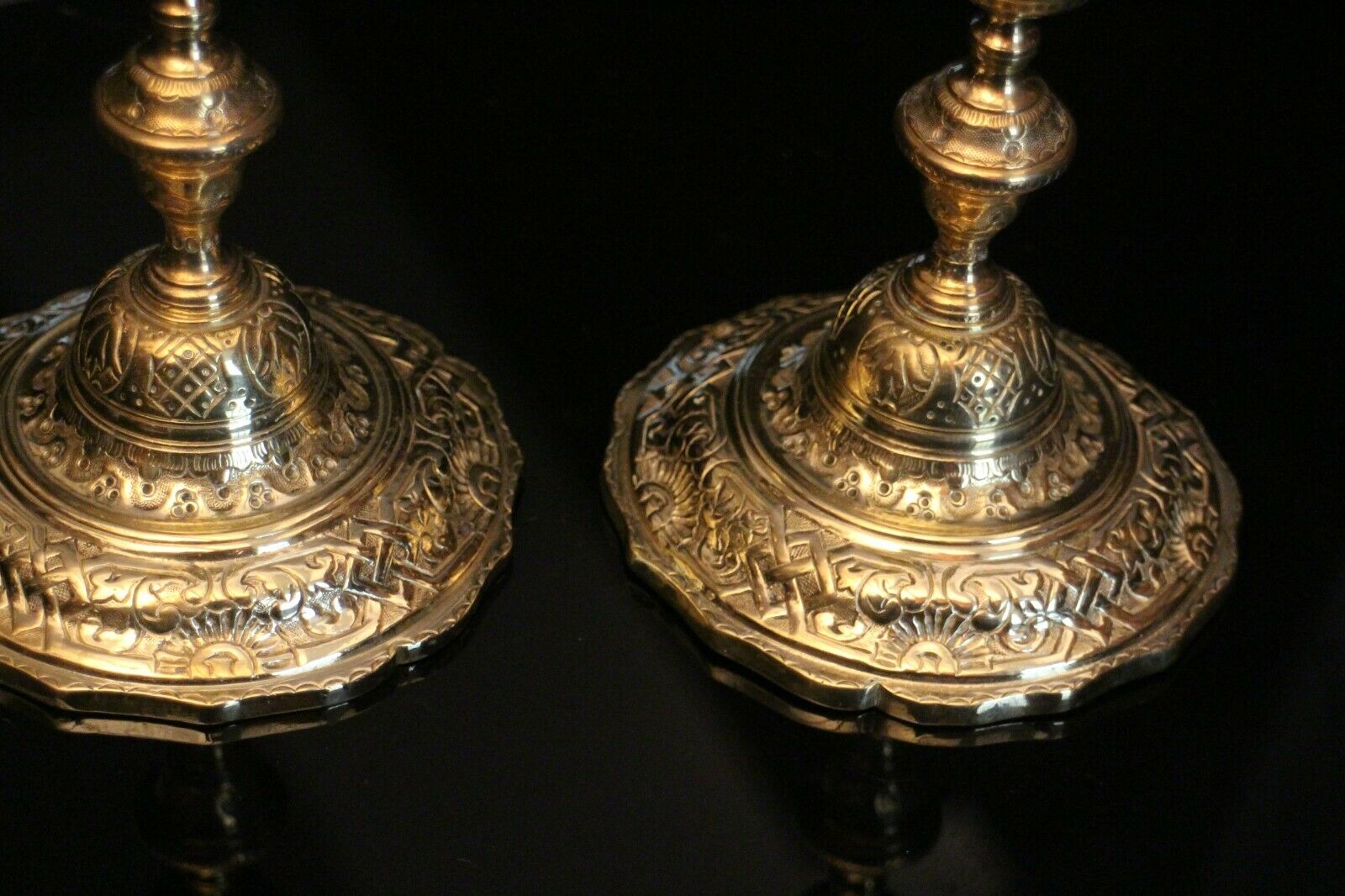 Pair of 19th bronze candlesticks with Regency-style chiseled decoration
