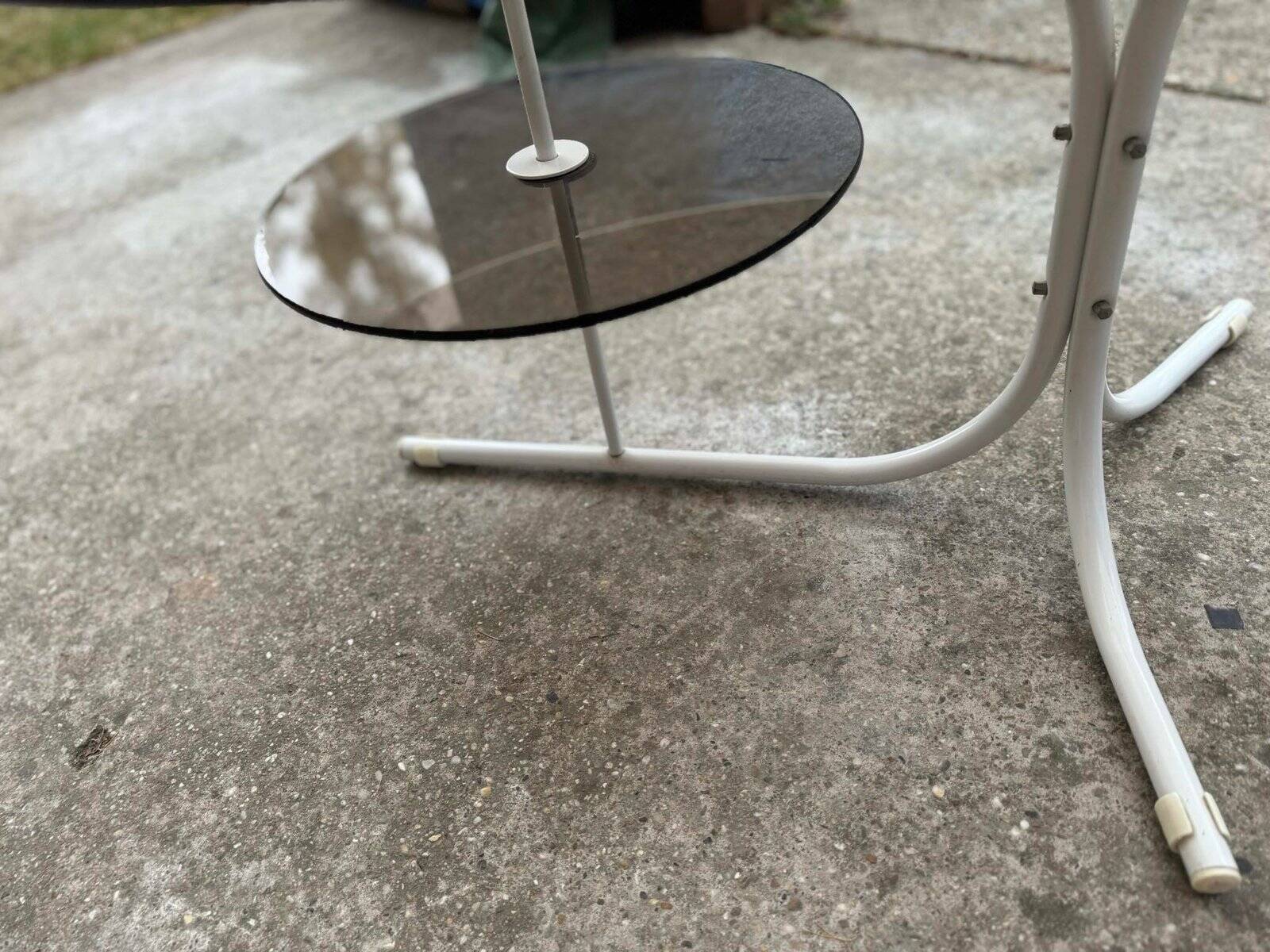 Coffee oval table with metal legs and smoky glass top, 1990s