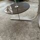 Coffee oval table with metal legs and smoky glass top, 1990s