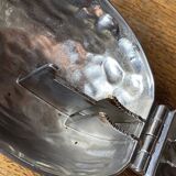 Nutcracker, shaped like a large nut, silver-plated metal