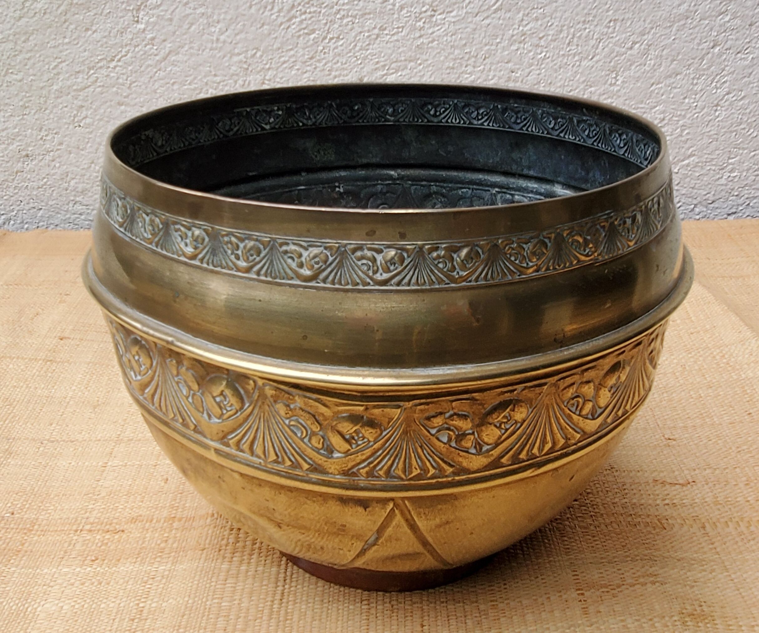 Brass pot cover