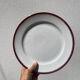 6 flat plates in gilded porcelain and burgundy