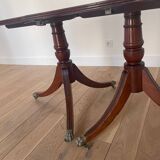 Antique table with wrought iron leg